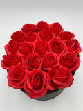 Red Roses in a round presentation box