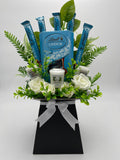 Blue Lindt Lindor Salted Caramel chocolate and Yankee Candle Bouquet